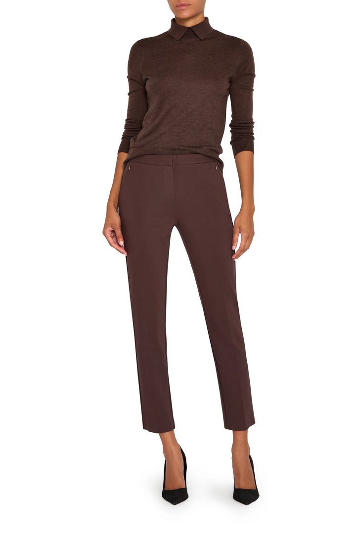 Slim, ankle-length cigarette knit pant with front zip pockets and tailored waistband, front view on white.