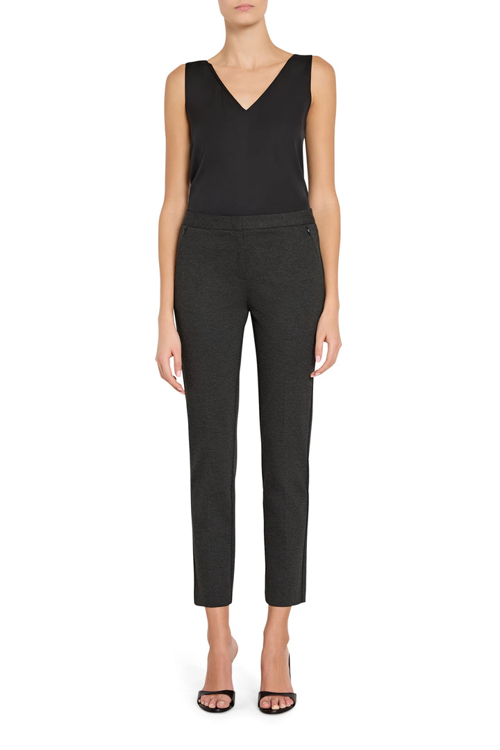 Slim, tailored cigarette pant with front zip pockets and fitted ankle, in knit fabric; front view on model.