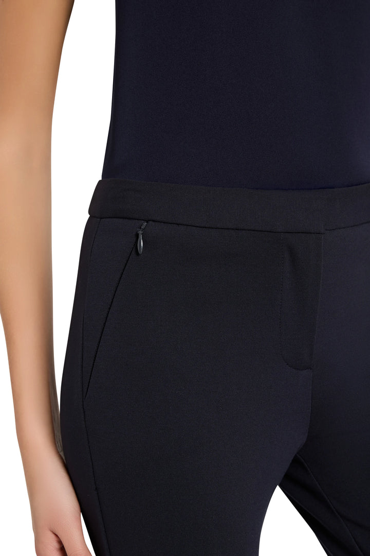Slim-fit, cigarette silhouette pant in knit fabric with tailored waistband and ankle-length hem; front view on white.