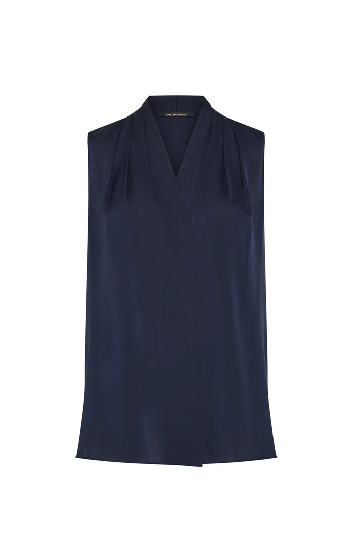 Mila Silk Blouse: sleeveless silk blouse, V-neck, pleated shoulders, front view on white.