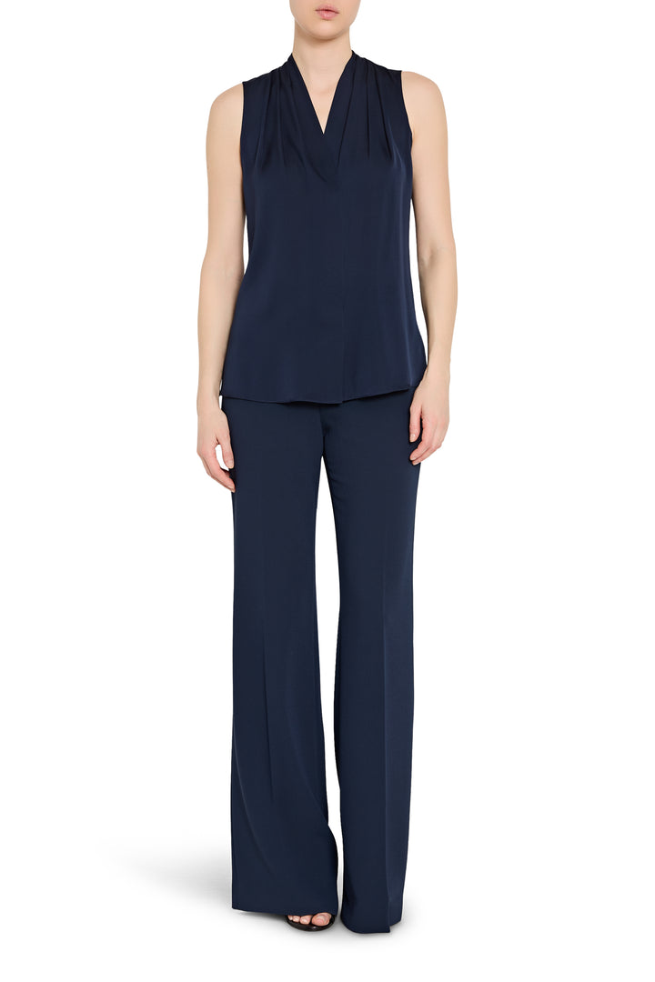 Navy sleeveless top and pants set on a white background