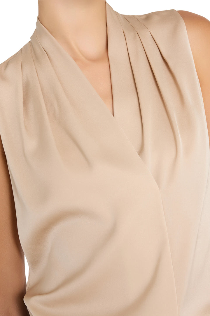 Draped crossover silk blouse with sleeveless, bra-friendly fit and smooth finish, detail view.