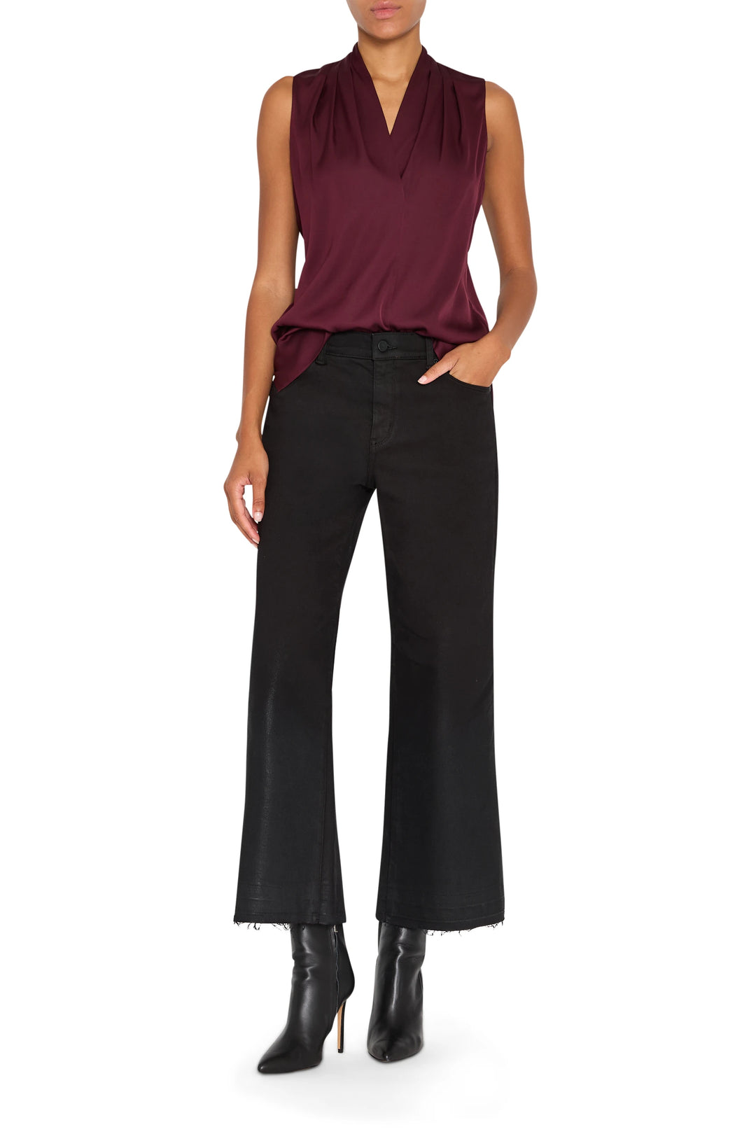 Silk blouse with relaxed silhouette, subtle drape and classic collar; front view on model.