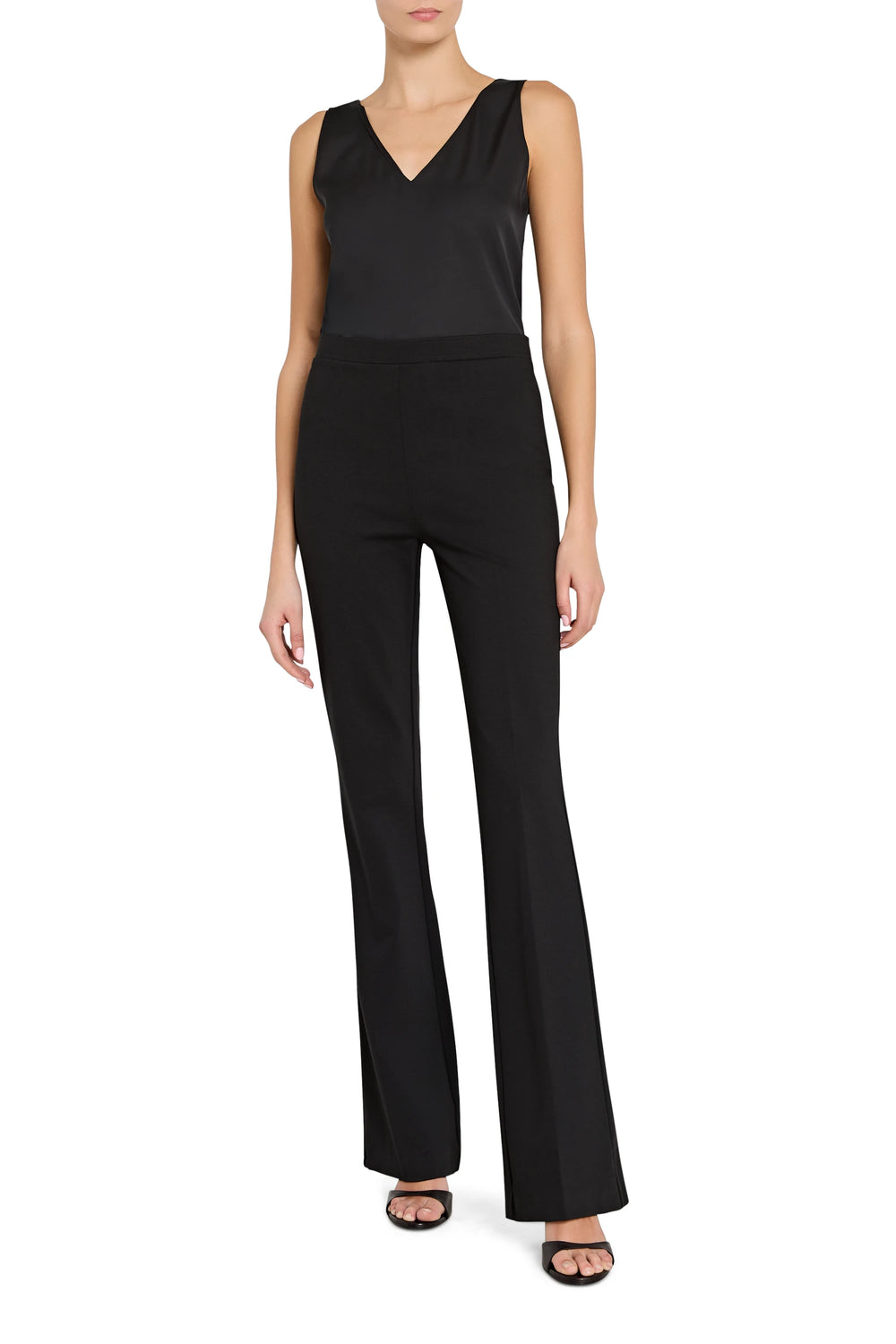 Wide-leg knit pant with stretchy waistband, clean lines, soft drape; front view on white.
