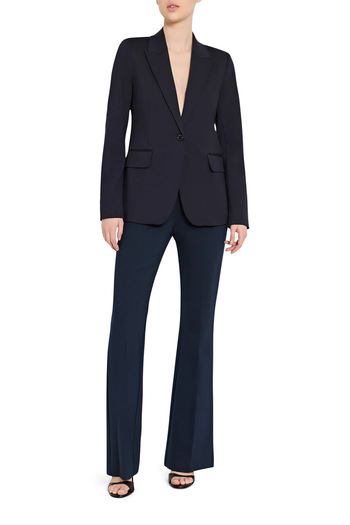 Wide-leg silhouette with structured waistband in soft knit fabric, full-length style. Front view on white.