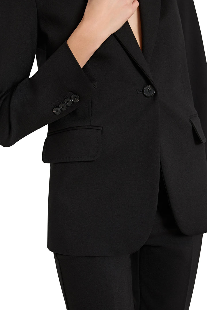 Tailored double knit blazer with structured shoulders and classic notch lapels, front view on model.