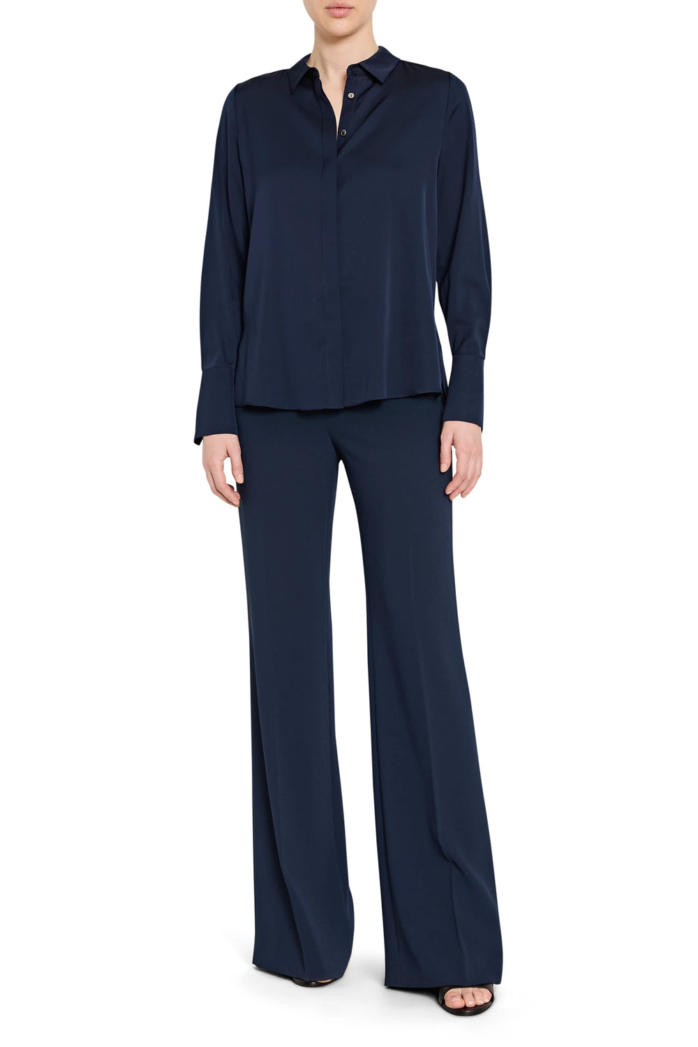 Navy blue outfit with a shirt and pants on a white background