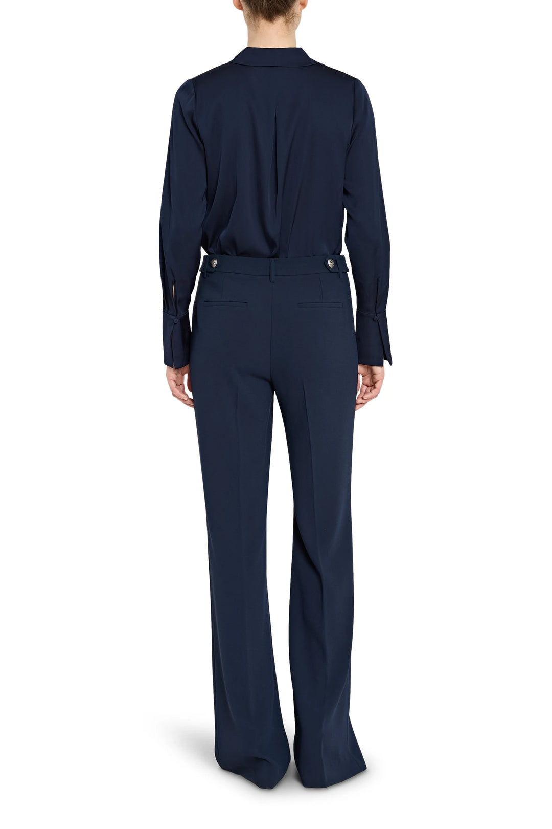 Navy blue suit with a shirt and pants on a white background