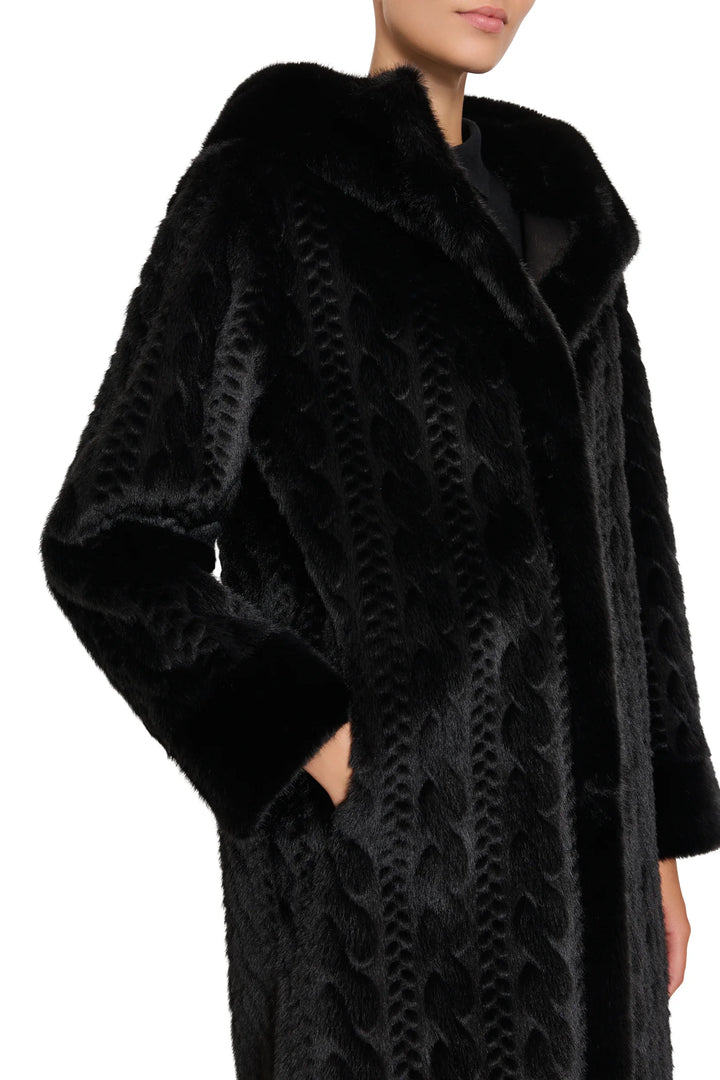 Longline faux fur coat with wide collar, cable knit detailing, relaxed fit. Front view on model.