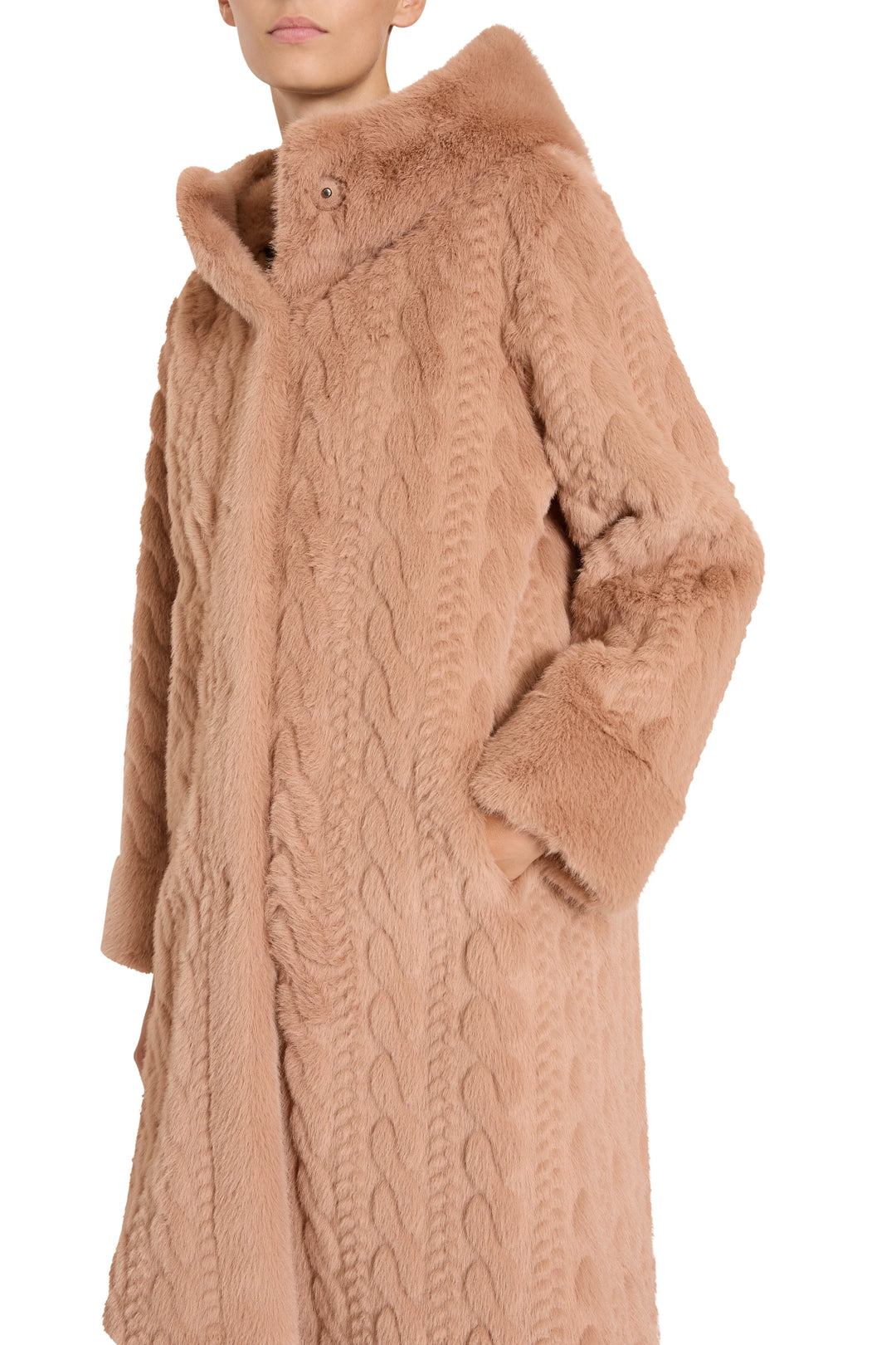 Faux fur coat with cable-inspired texture, large cuffs, hood, relaxed silhouette; front view on model.