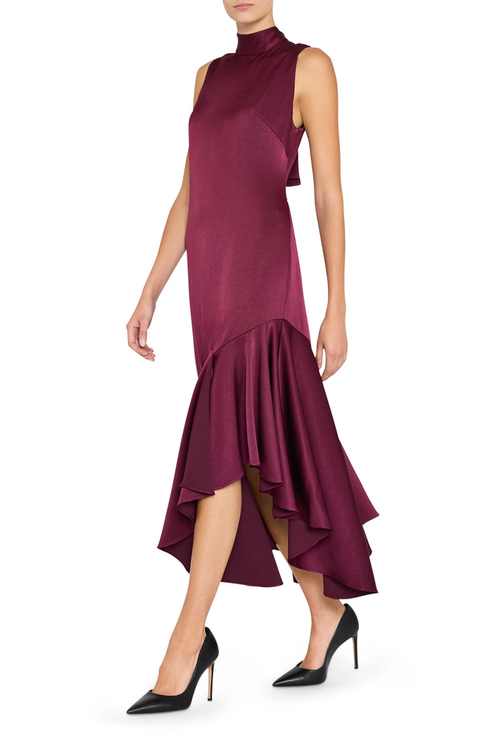 Jenkins Satin Back Crepe Dress with asymmetrical hem, draped silhouette, fluid construction; front view on model.