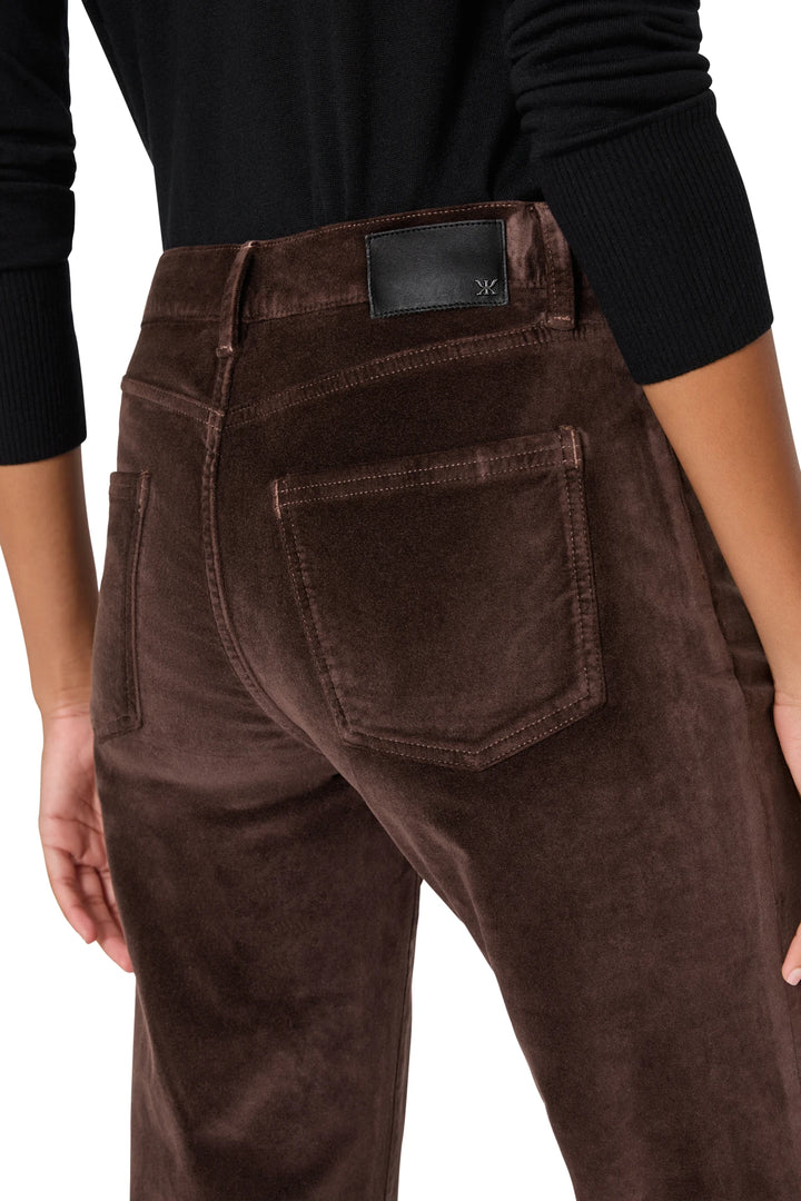Wide-leg stretch velvet pant with rear pocket, classic waistband and full-length silhouette; back view on model.