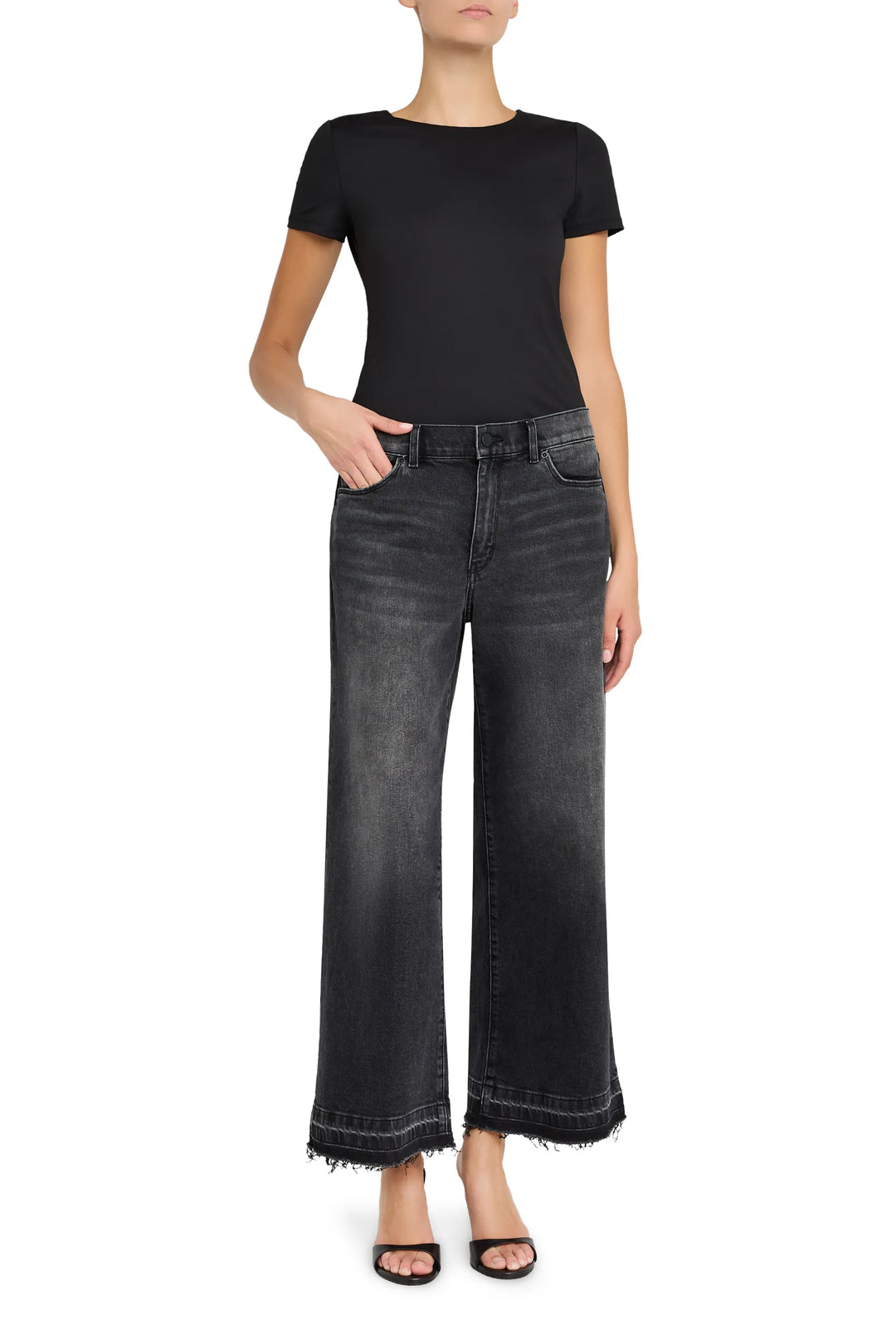 Cropped flare jean with wide-leg silhouette, classic five-pocket design, constructed denim; front view on model.