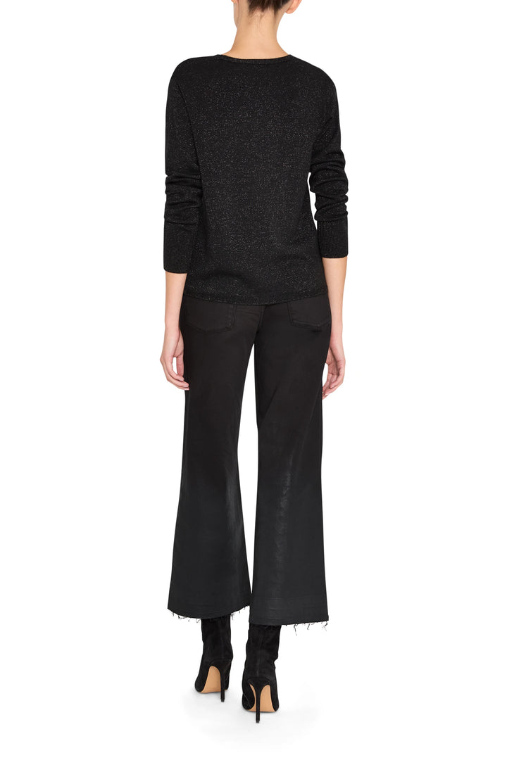 Relaxed-fit sweater with deep V-neckline and ribbed trim, soft knit fabric, back view on model.