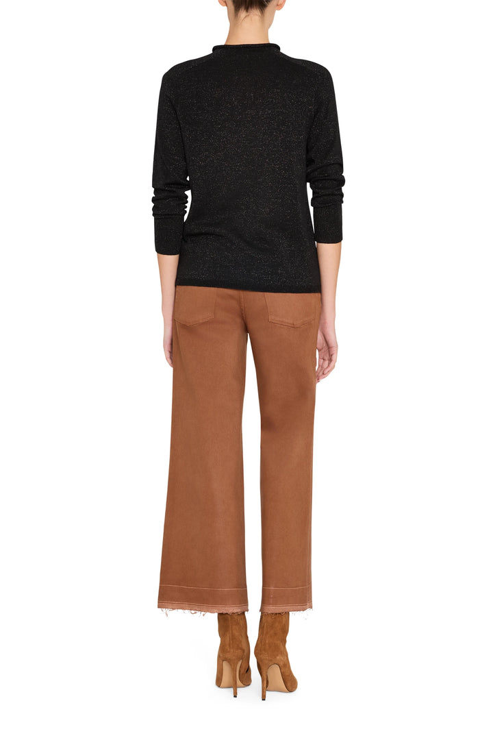 Slim, long-sleeve mock neck sweater with clean finish and minimal seams, fitted silhouette, back view on model.