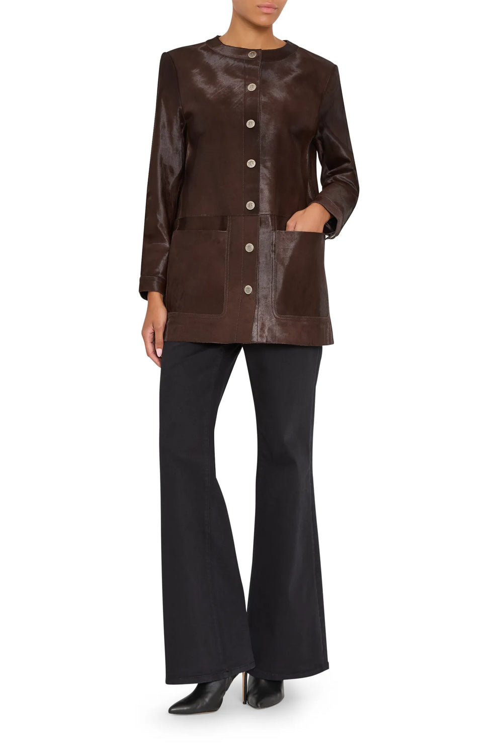 Longline silhouette coat with pony-effect finish, structured shoulders, concealed closure. Front view on white.