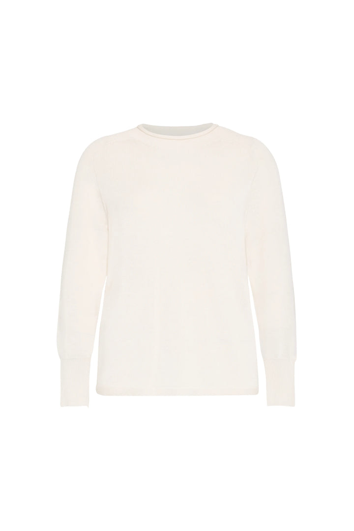 White seamless knit sweater with mock neck, long sleeves, modern straight silhouette; front view on white.