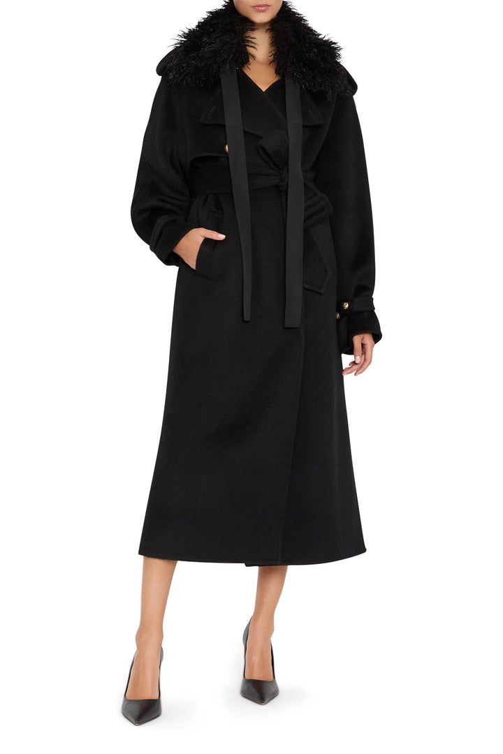 Long coat with faux fur collar, tailored silhouette, on-seam pockets, button closure; front view on model.