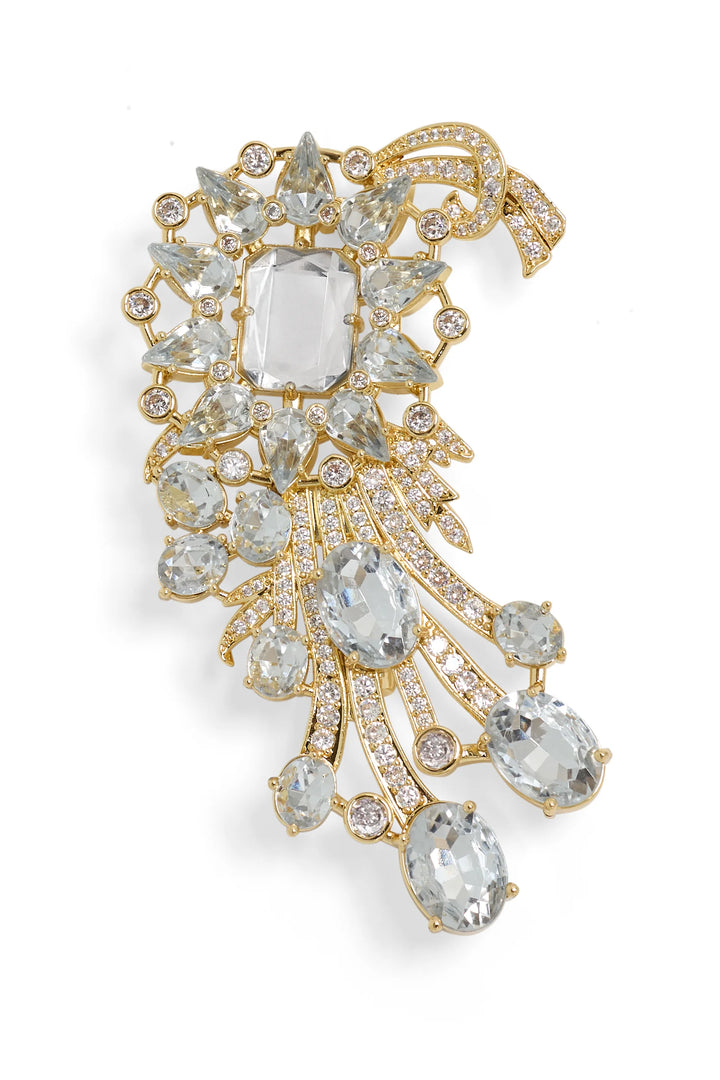Claude Brooch: sculptural crescent silhouette with crystal and clear gemstone embellishments. Front view on white.