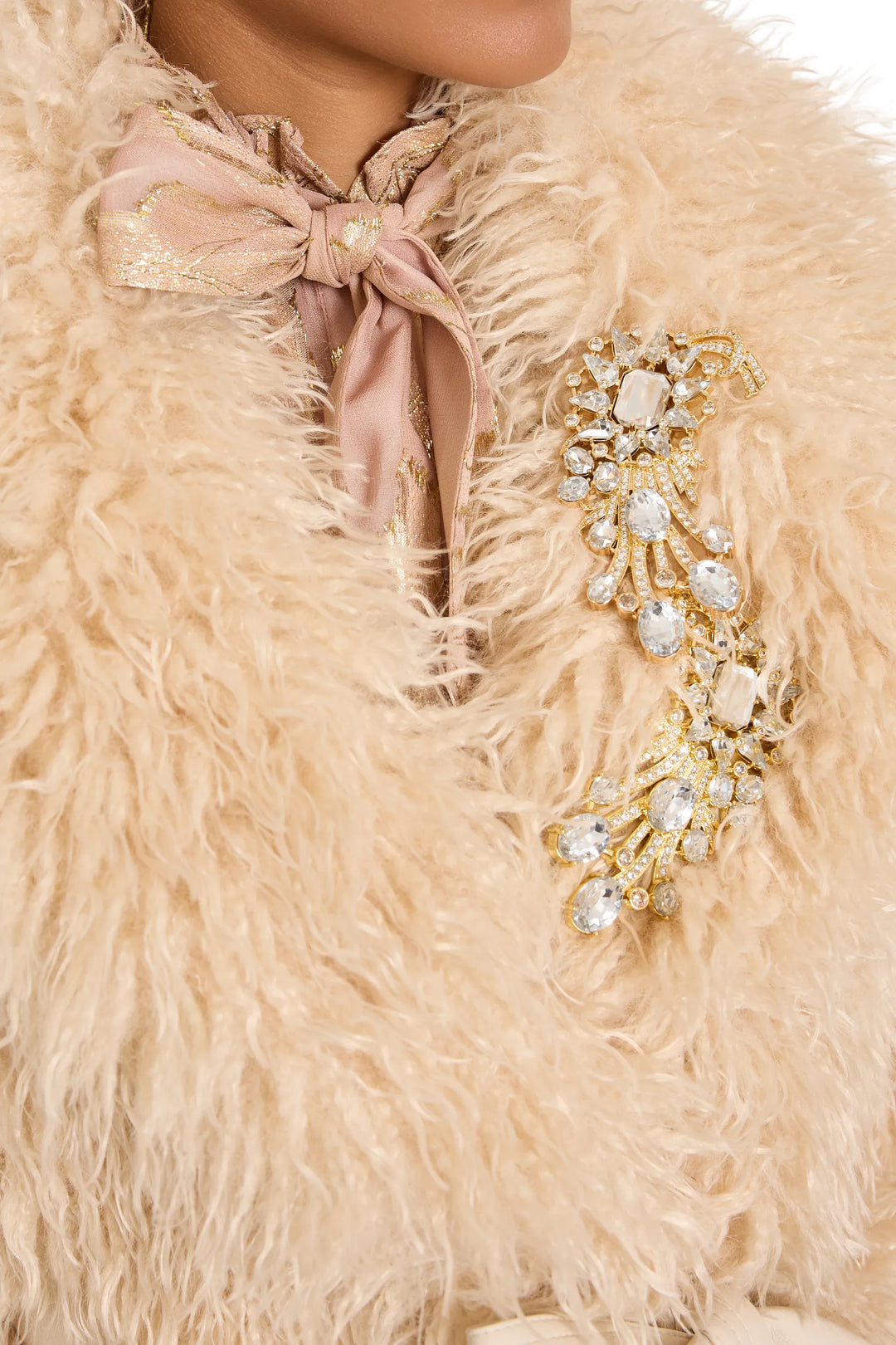 Helen Brooch, oval silhouette with gold finish and intricate hand-embellished detailing, front view on white.