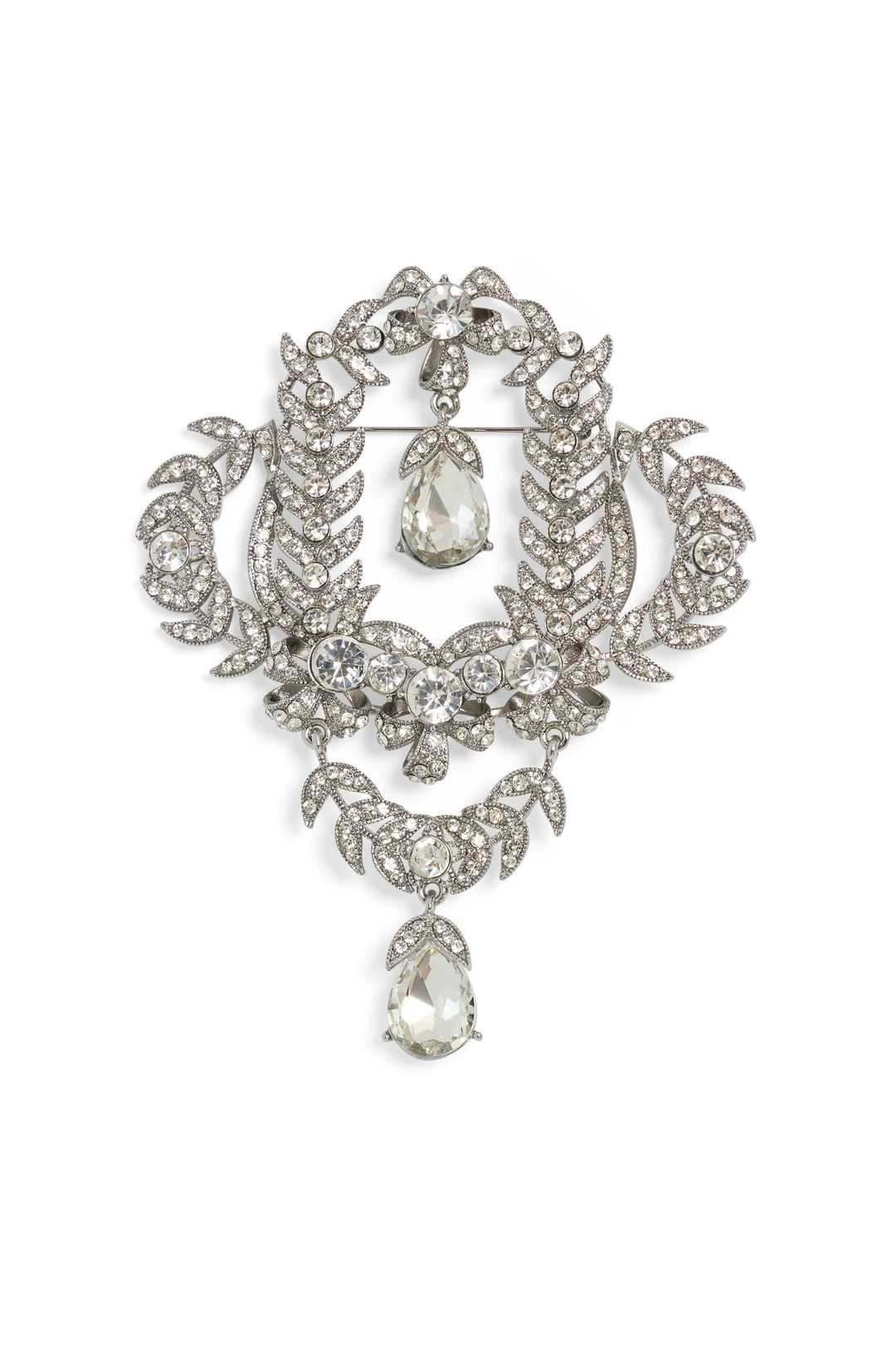 Vintage silver floral brooch, hand-embellished with clear gems, crystal teardrop pendant; front view on white.