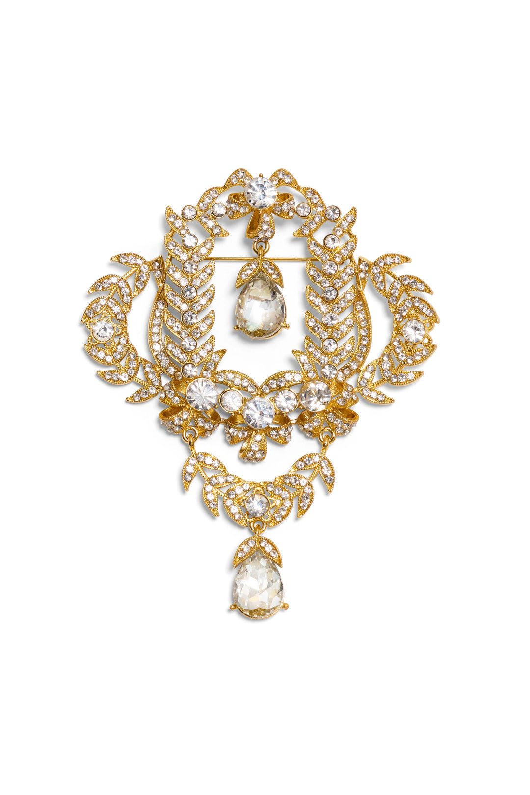 Gold heirloom brooch with leaf motifs, pavé-set diamonds, crystal teardrop pendant; front view on white.