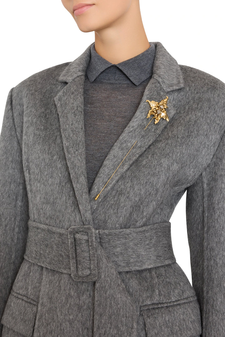 Collared wool-blend coat with a belted waist and tailored fit. Front view on model.