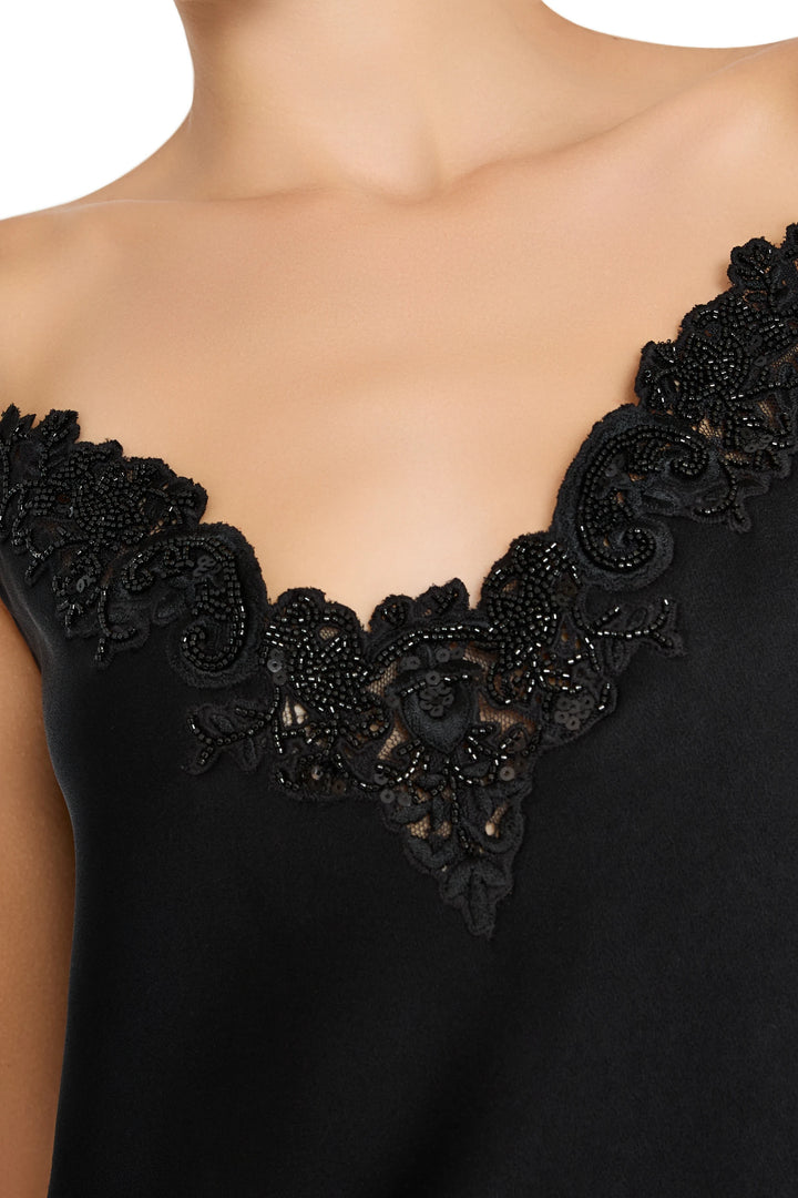 Beaded neckline trim and floral embroidery detail on cami’s upper chest area, fine fabric, detail view.