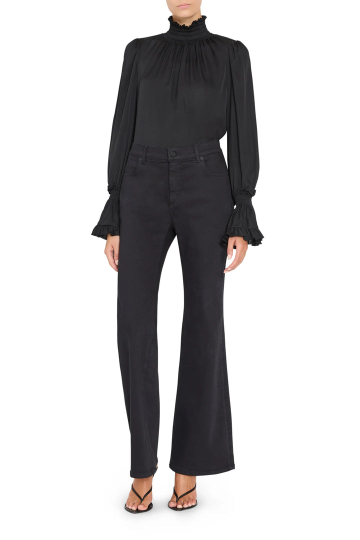 Maxine Silk High Neck Blouse in black silk with smocked neckline and long, dramatic sleeves, front view on model.