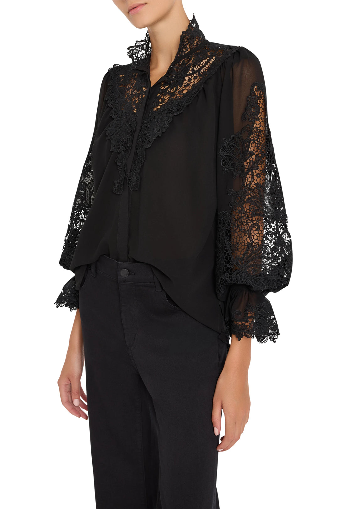 Relaxed-fit blouse with long sleeves, lace embroidery detail. Front view on model.