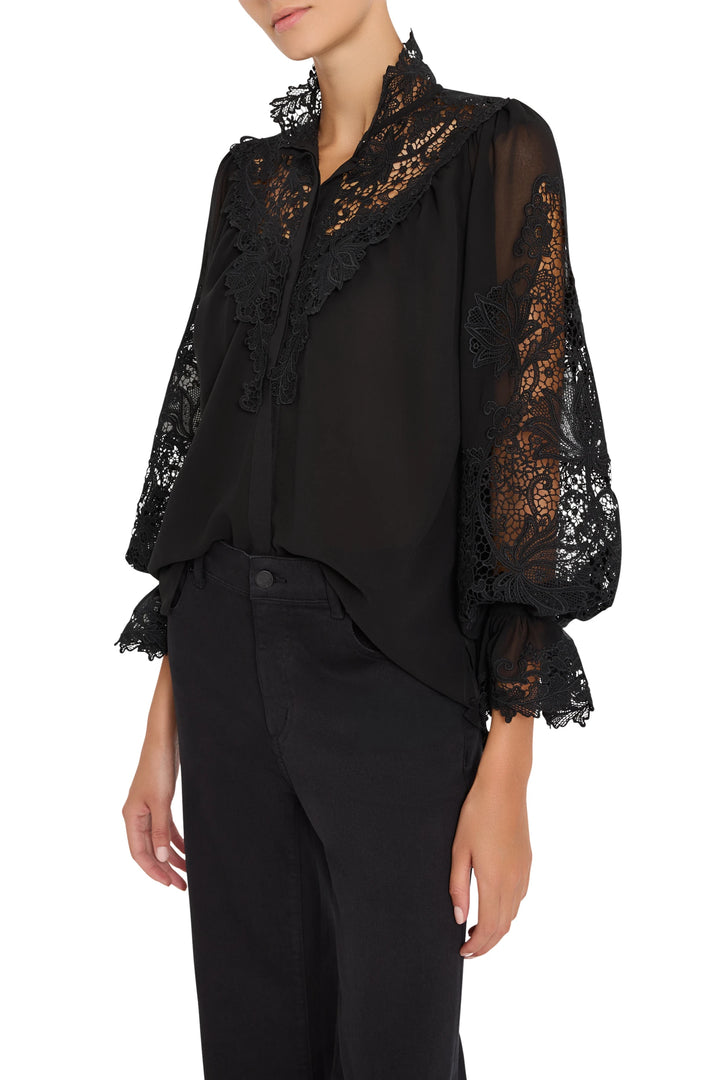Relaxed-fit blouse with long sleeves, lace embroidery detail. Front view on model.
