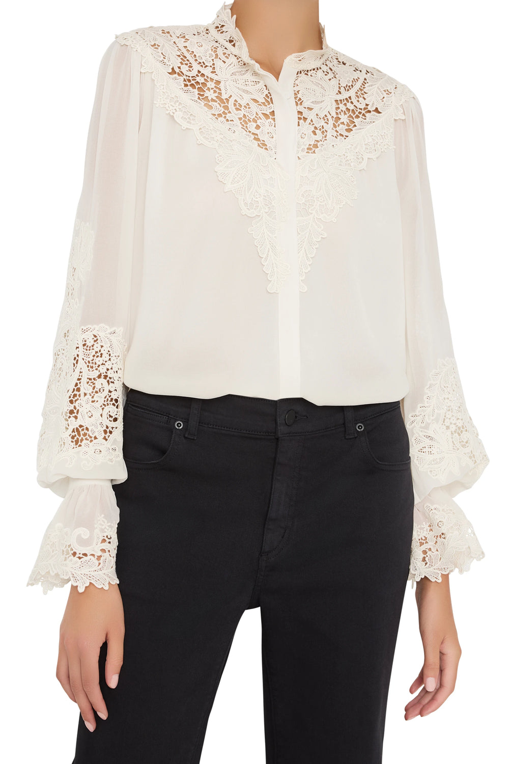 Antique-inspired white blouse with long sleeves, lace embroidery, relaxed fit; front view on model.