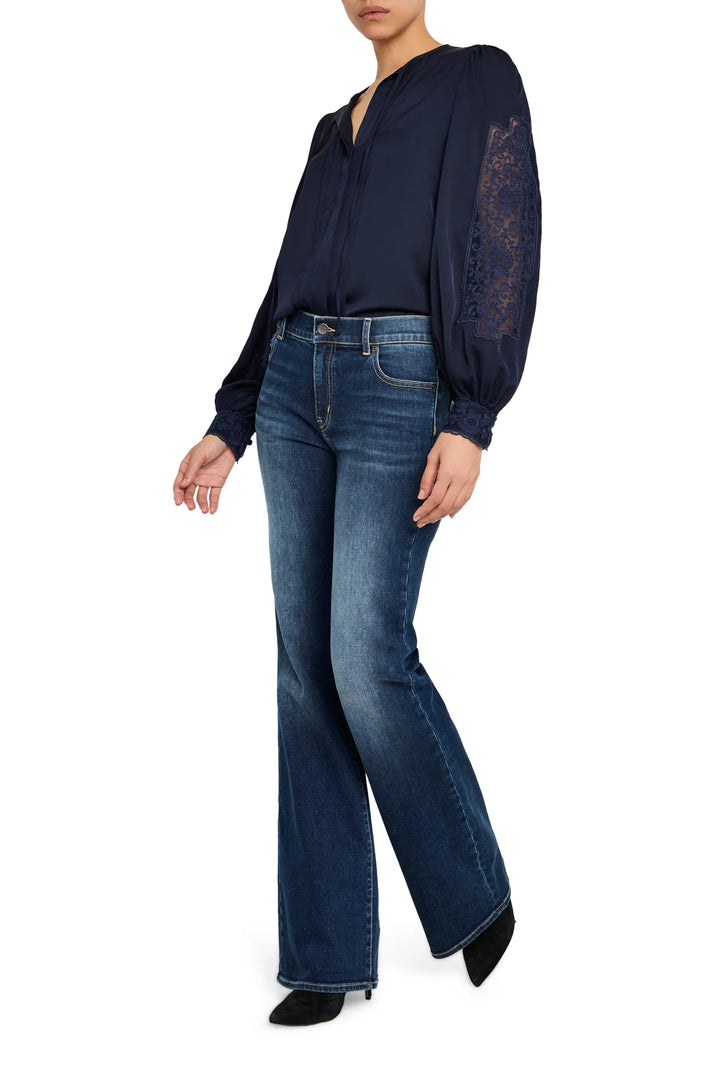 Silk blouse with lace trim, relaxed fit, delicate construction. Front view on white.