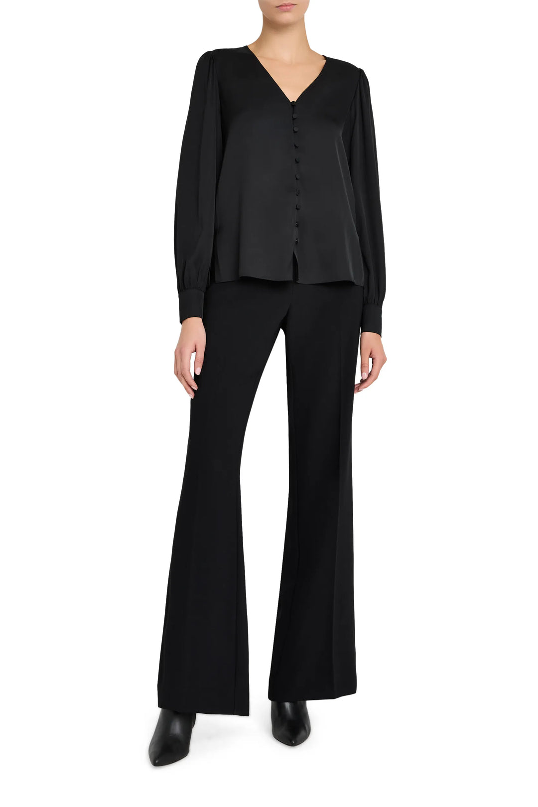 V-neck blouse with button-down front, relaxed fit, soft drape, set-in sleeves; front view on model.