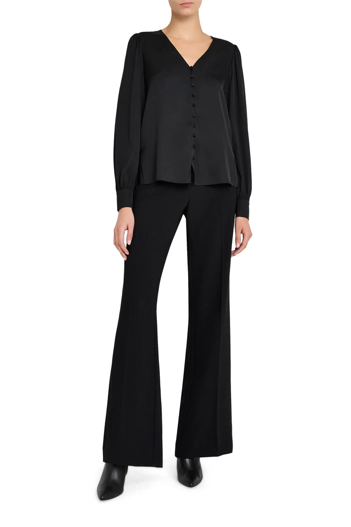 V-neck blouse with button-down front, relaxed fit, soft drape, set-in sleeves; front view on model.