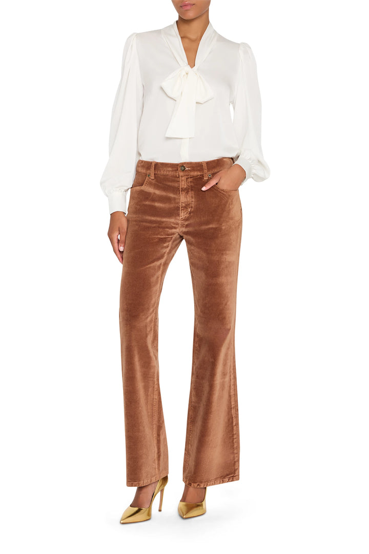 Selena Blouse with relaxed silhouette and pintucked bodice, long sleeves; front view on model.