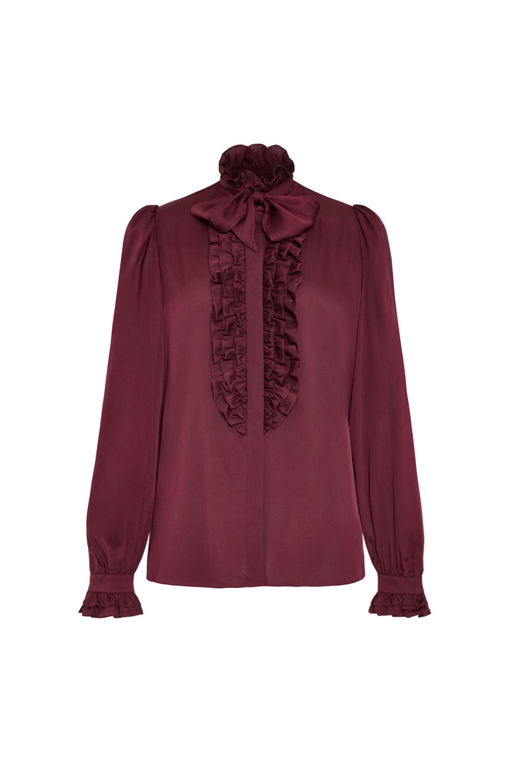 Silk-blend blouse with ruffled front, handkerchief tie neck, ruffled cuffs, fluid silhouette; front view on white.