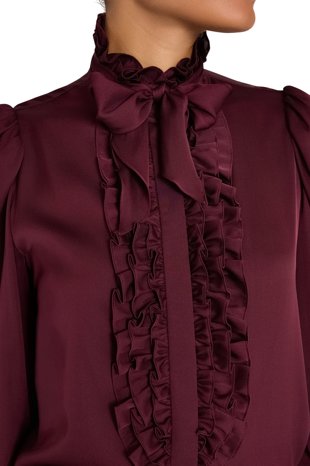Stretch silk ruffle blouse with handkerchief tie-bow neckline and layered ruffle trim, front view on white.