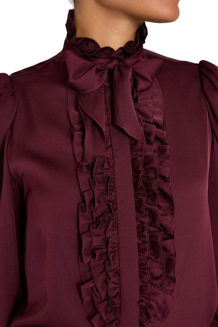 Stretch silk ruffle blouse with handkerchief tie-bow neckline and layered ruffle trim, front view on white.