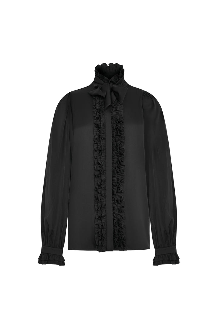 Silk blouse with long sleeves, ruffled collar, bow neck, ruffle trim on front and cuffs. Front view on white.
