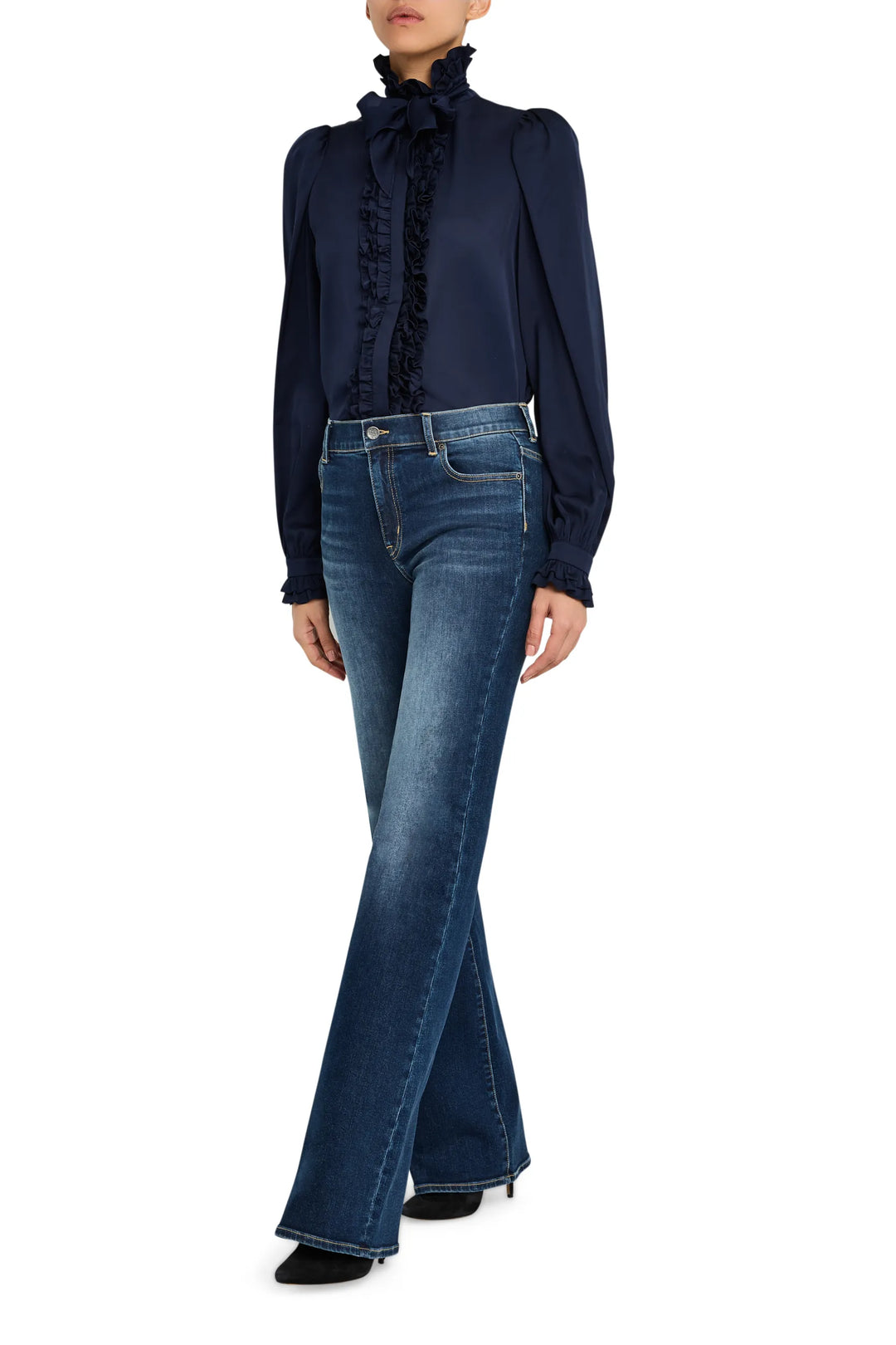 Silk blouse with ruffled neckline, long sleeves, and fluid silhouette. Front view on white.