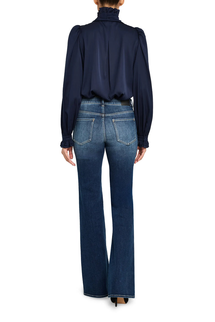 Silk blouse with ruffled trim, long sleeves, fluid fit, keyhole back; back view on white.