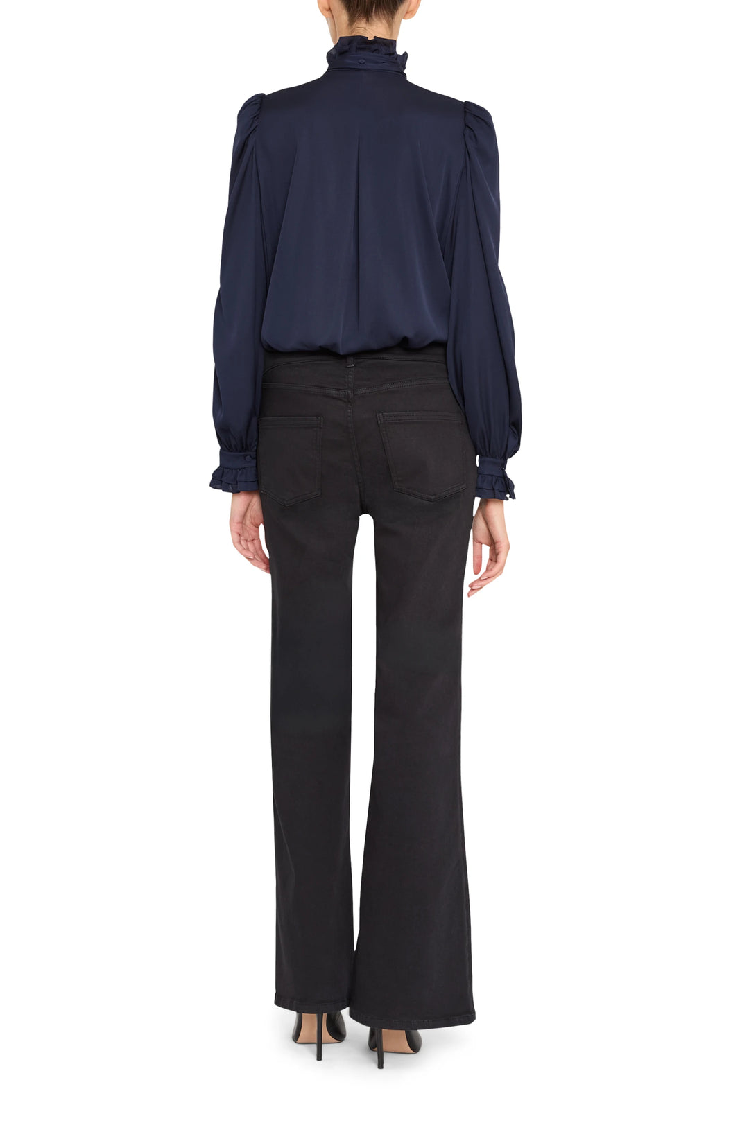 Silk blouse with ruffled collar and cuffs, relaxed fit, long sleeves. Back view on model.