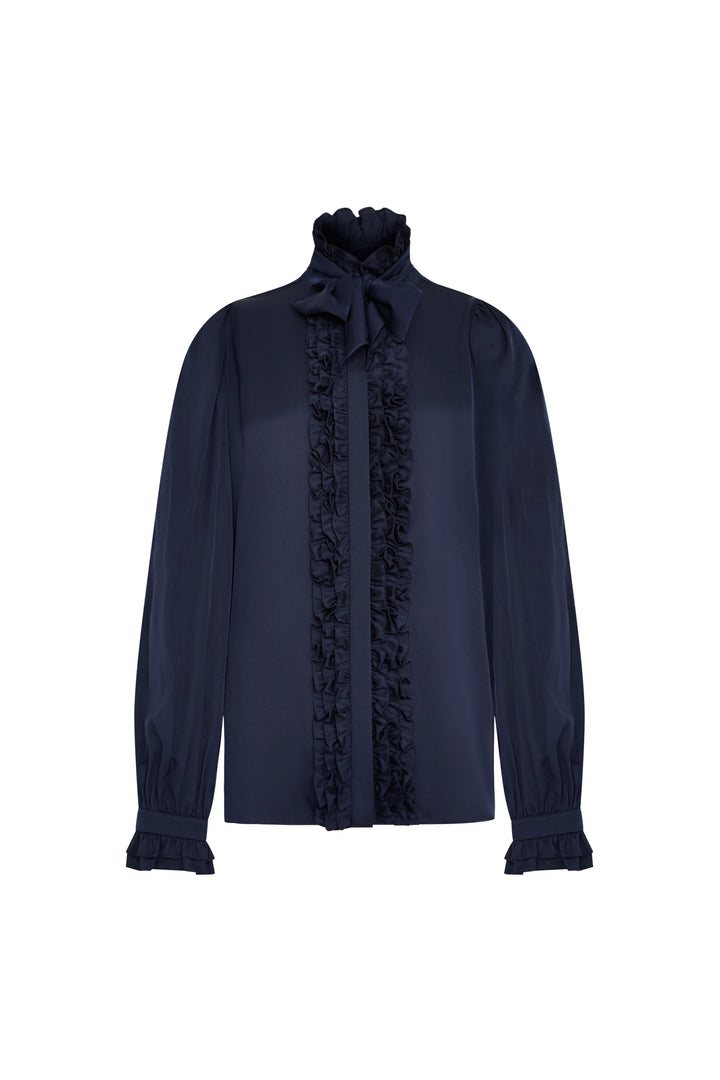 Silk blouse with high neck bow, ruffled front, long sleeves with ruffled cuffs. Front view on white.