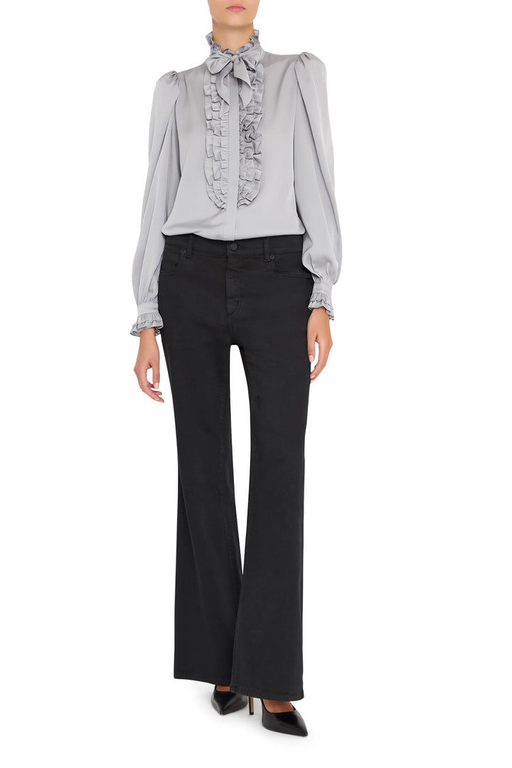 Silk ruffle blouse with cascading front ruffles, soft drape, and tailored cuffs; front view on white.