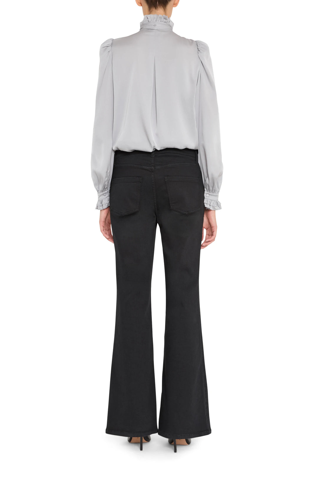 Silk blouse with ruffled collar, fluid silhouette, and back pleat detail; back view on model.