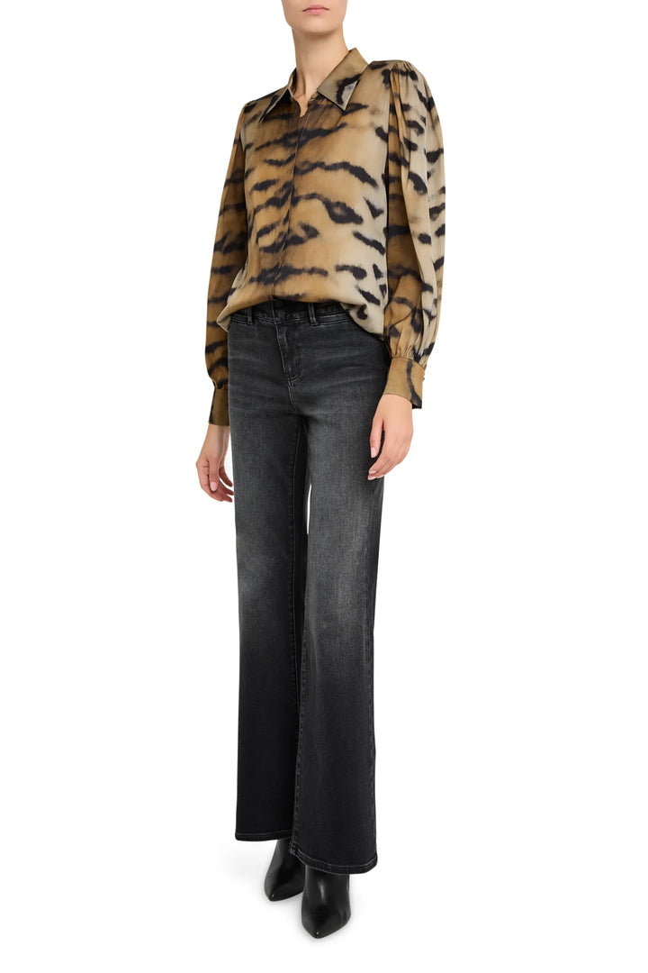 Relaxed-fit blouse with allover print, button front, and gathered cuffs. Front view on model.