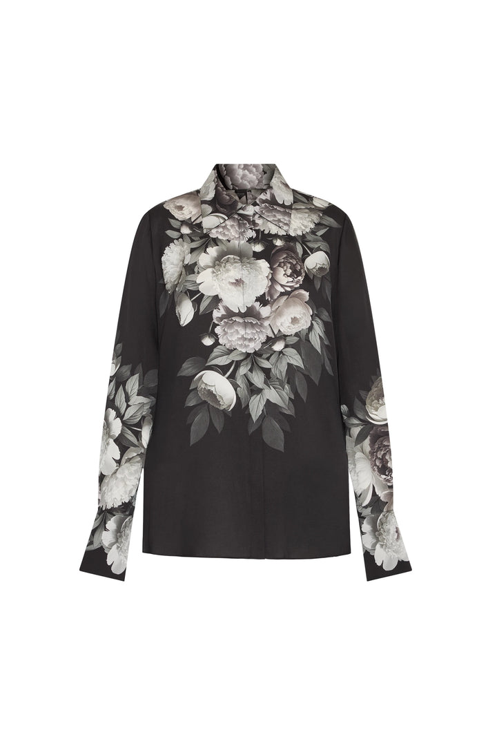 Long-sleeve silk blouse with botanical print, button collar, straight fit. Front view on white.