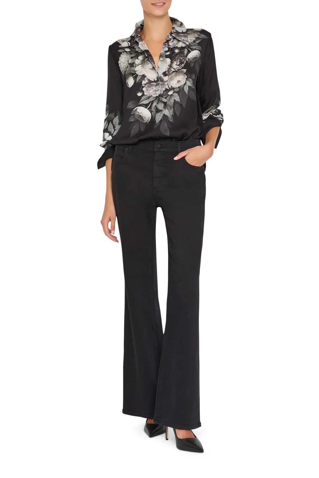 Relaxed-fit silk blouse with signature print and straight hem. Front view on model.