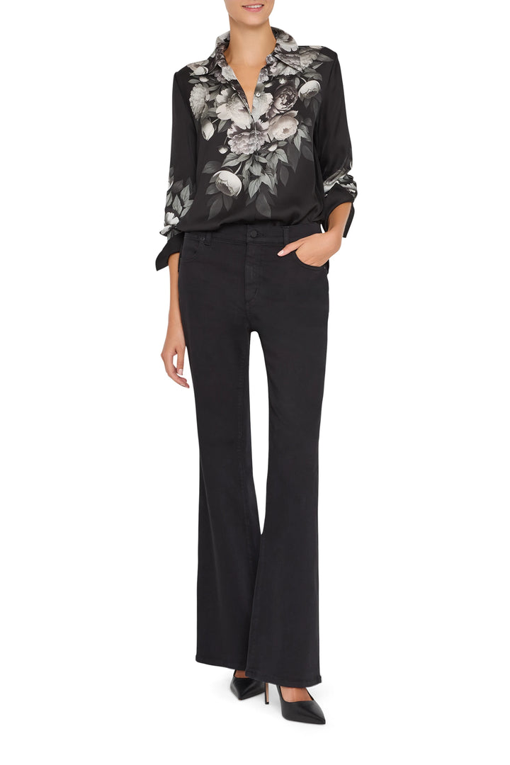 Relaxed-fit silk blouse with signature print and straight hem. Front view on model.